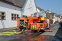 Feuer 3 Dachstuhlbrand Koeln Rath Heumar Gut Maarhausen Eilerstr P567